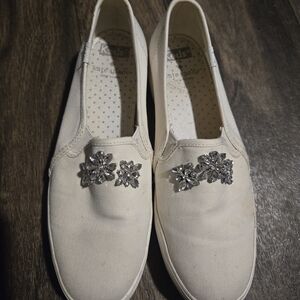 Kate Spade Women's Cream Slip-On Sneakers with Silver Embellishments 6.5